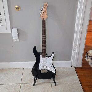Brand new Yamaha Pacifica electric guitar with stand.  Yamaha PAC012 Pacifica